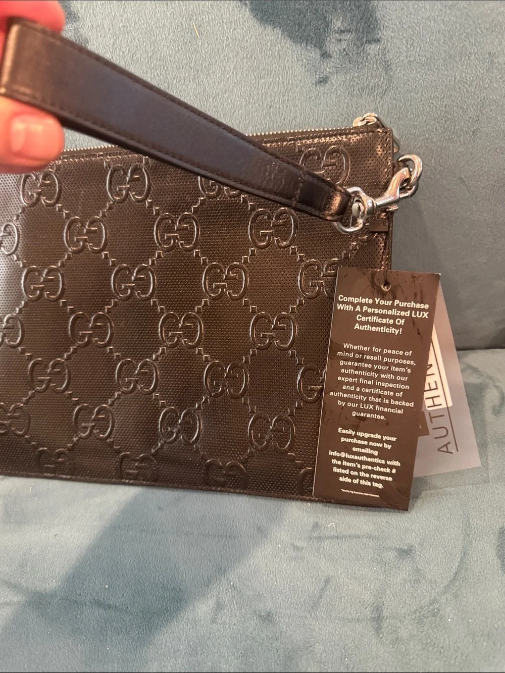 Jumbo Gucci Black Embossed GG Leather Wrist Pouch
